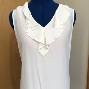 Silk sleeveless ruffle neck blouse